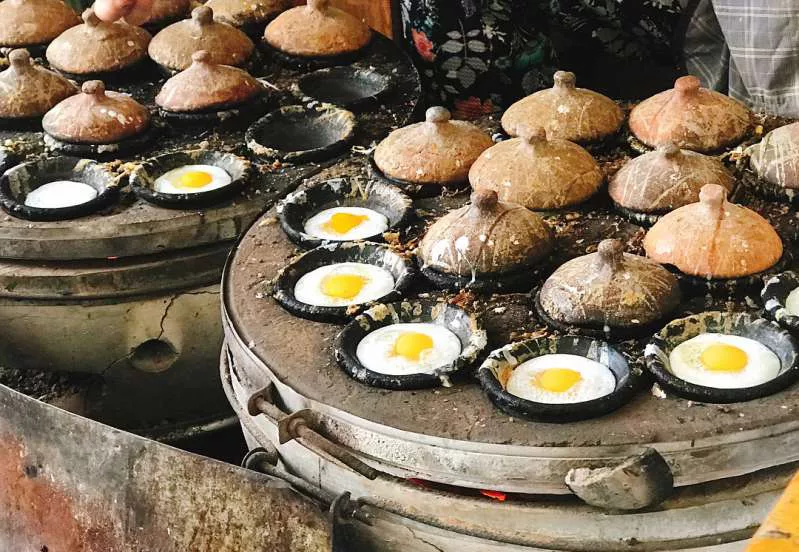 Trải nghiệm ăn vặt và làm bánh căn ở tp Đà Lạt Trải nghiệm làm bánh căn ở Đà Lạt