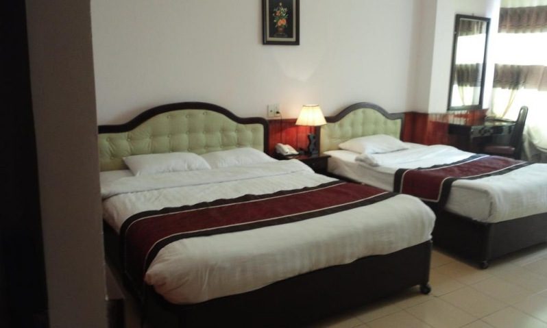 Phòng ngủ bên trong khách sạn Anh Đào ở Đà Lạt Phòng ngủ bên trong khách sạn 2 sao Anh Đào Hotel ở Đà Lạt