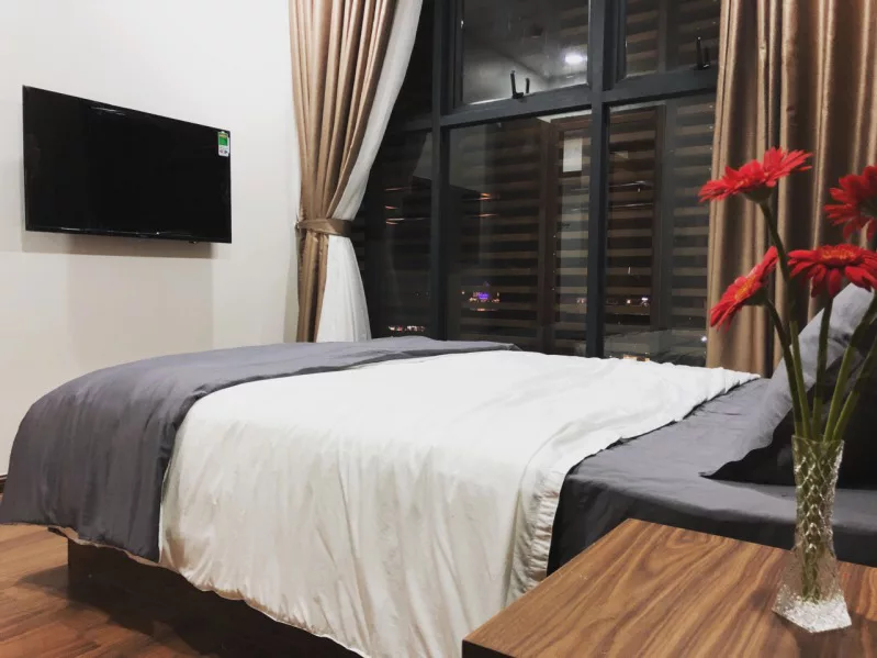 Phòng ngủ ở bên trong căn hộ du lịch cho thuê Dalat Center House